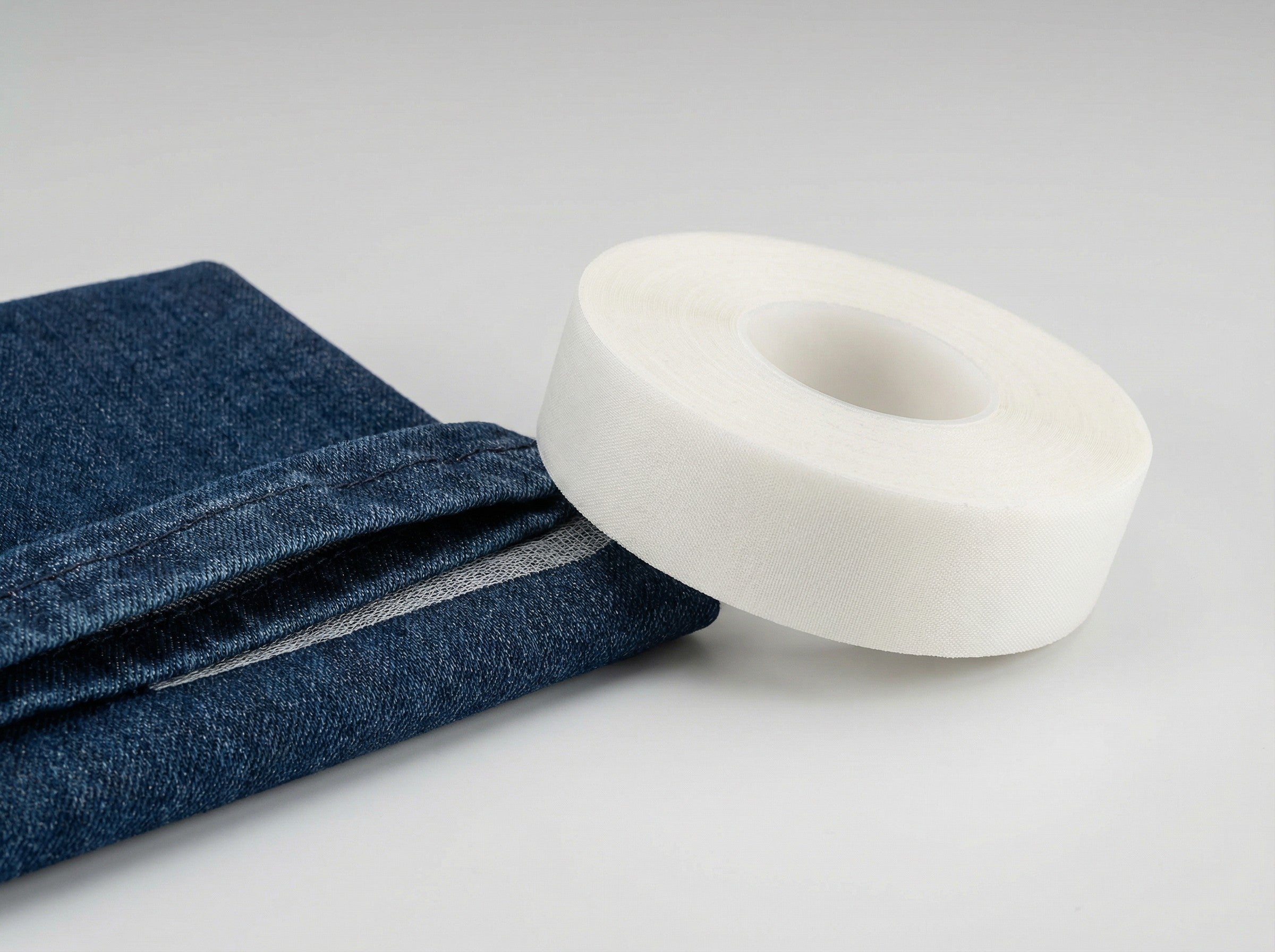 Iron-On Hot Melt Adhesive Hem Tape For Garment.